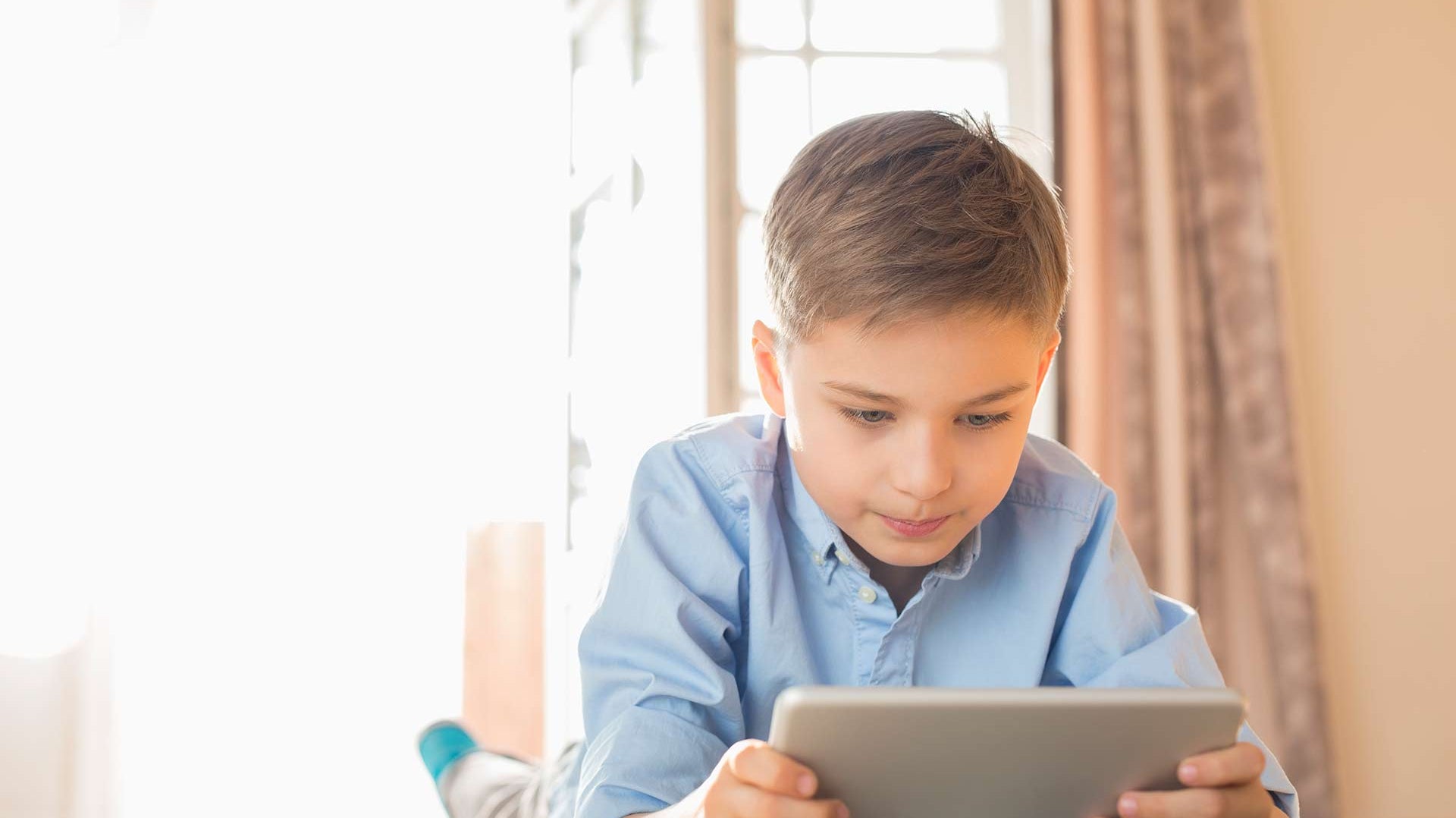 Emicrania nei bambini: cosa si nasconde dietro l'utilizzo del tablet?